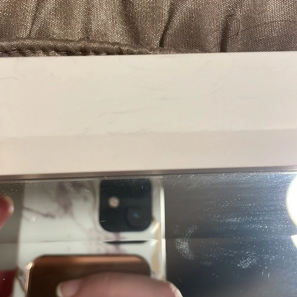 White frame square mirror